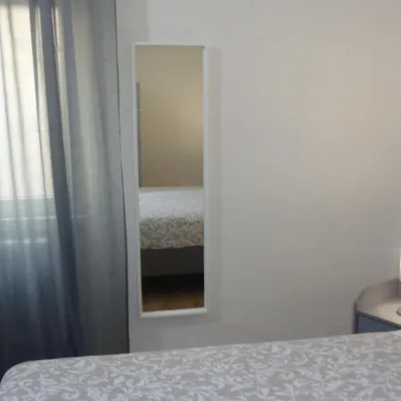 The Door In The And Parking Space Πανσιόν Garlate